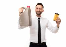 the car dealer recommends changing the oil and filters at a service station, the businessman offers